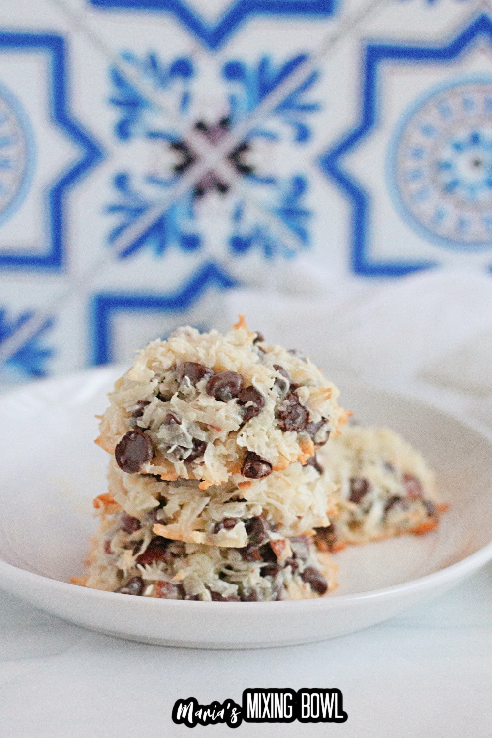 three almond joy cookies on a white plate