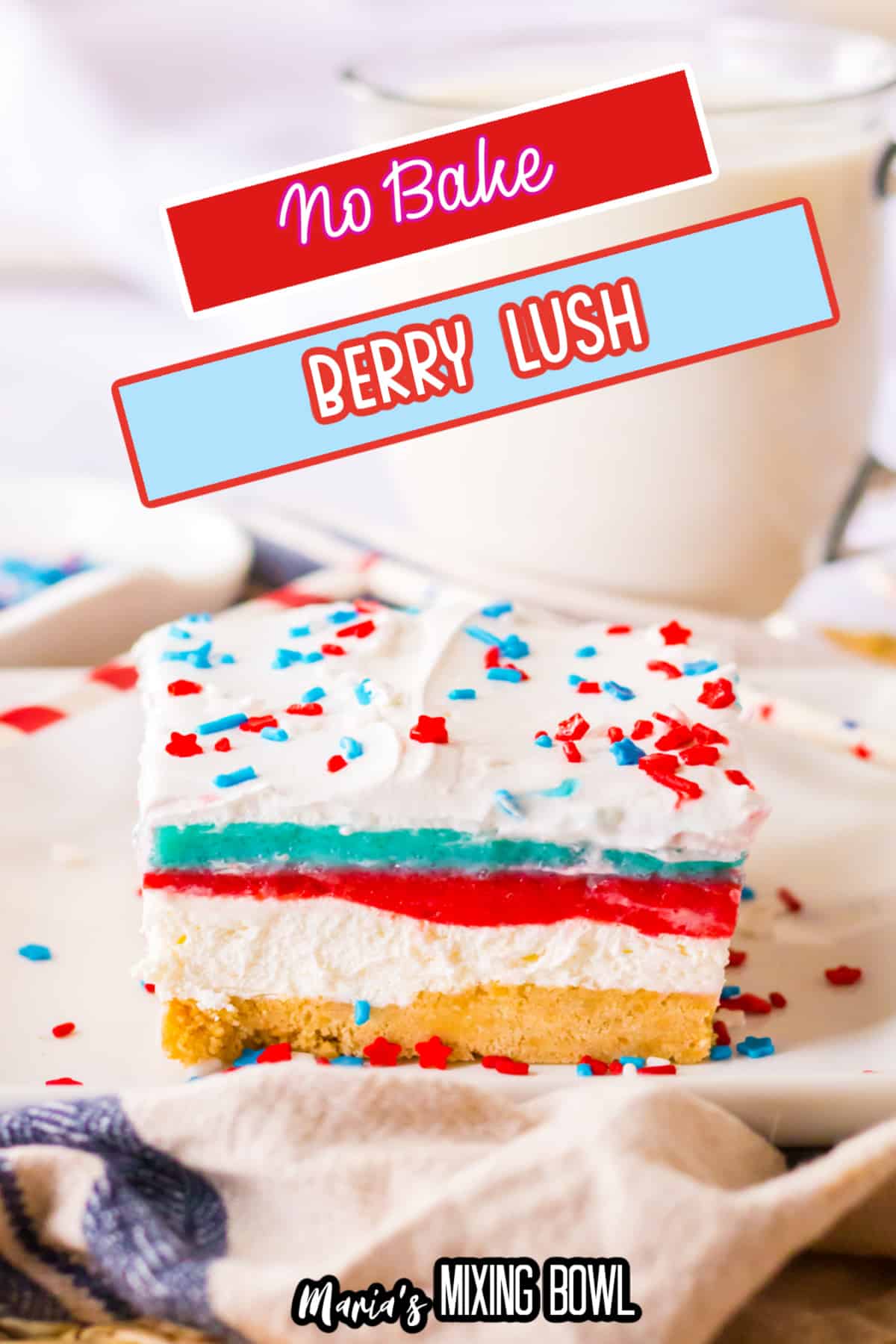 slice of no bake berry lush on a white plate