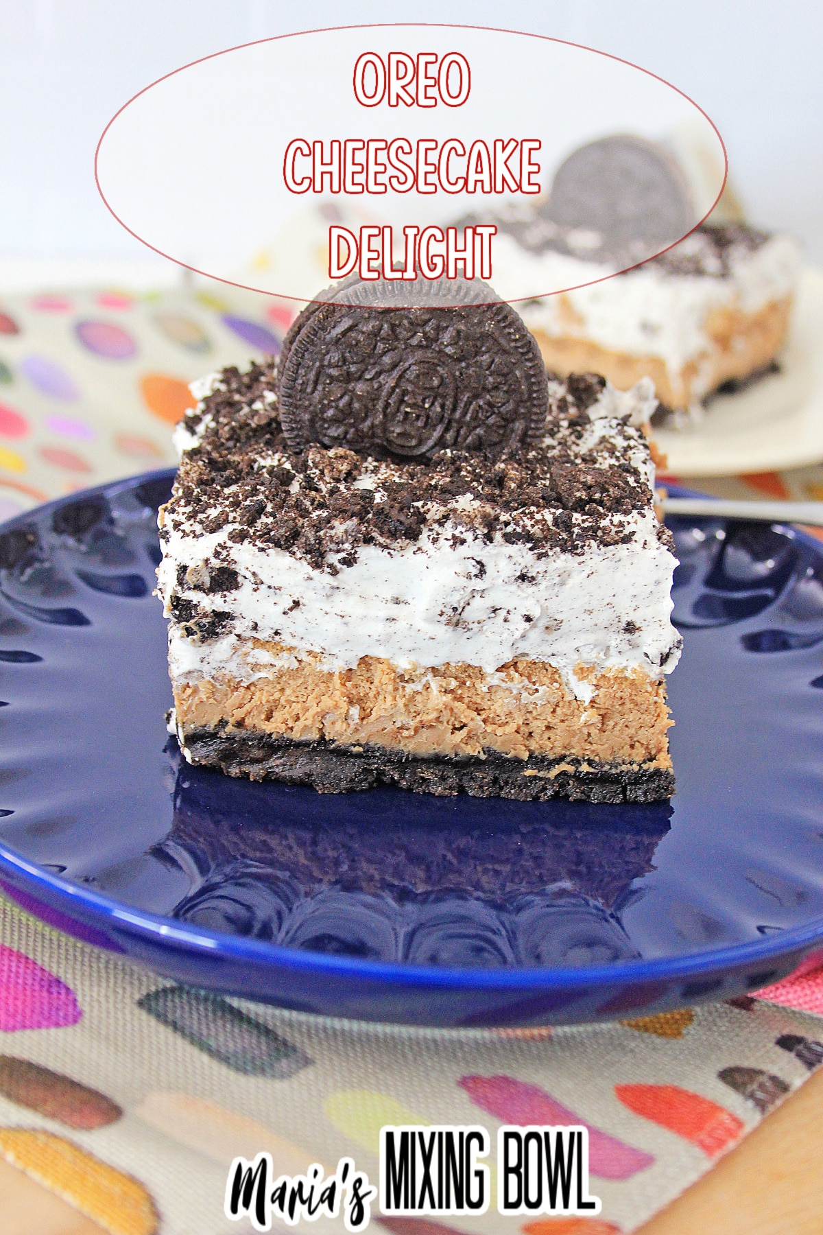 slice of oreo cheesecake delight on a blue plate