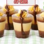 peanut butter cup shots on a green and white kitchen towel