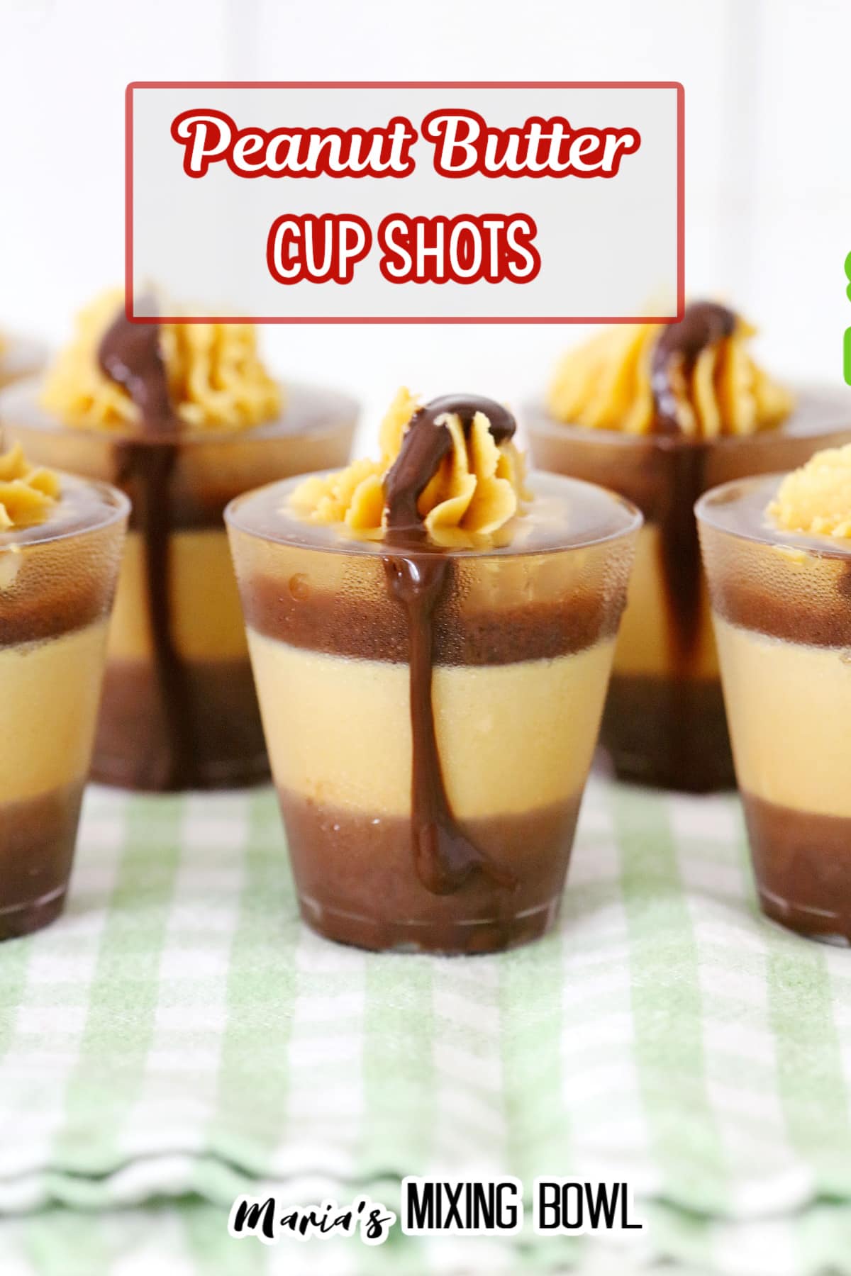 peanut butter cup shots on a green and white kitchen towel