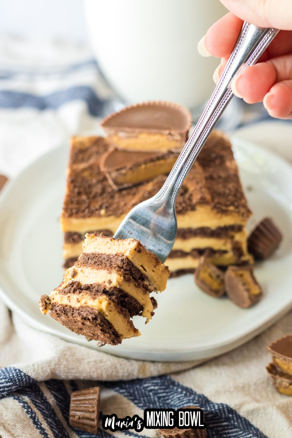 bite of peanut butter icebox cake on a fork