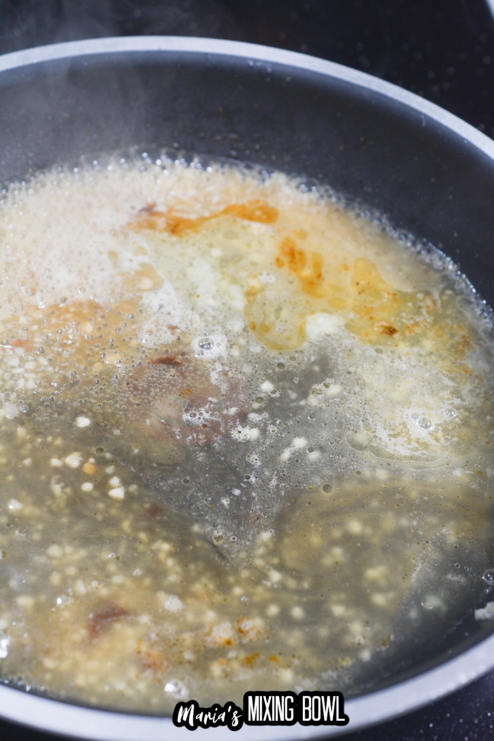melted butter, white wine sauce in a garlic sauce