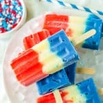 red white and blue pudding pops stacked on a bed of ice