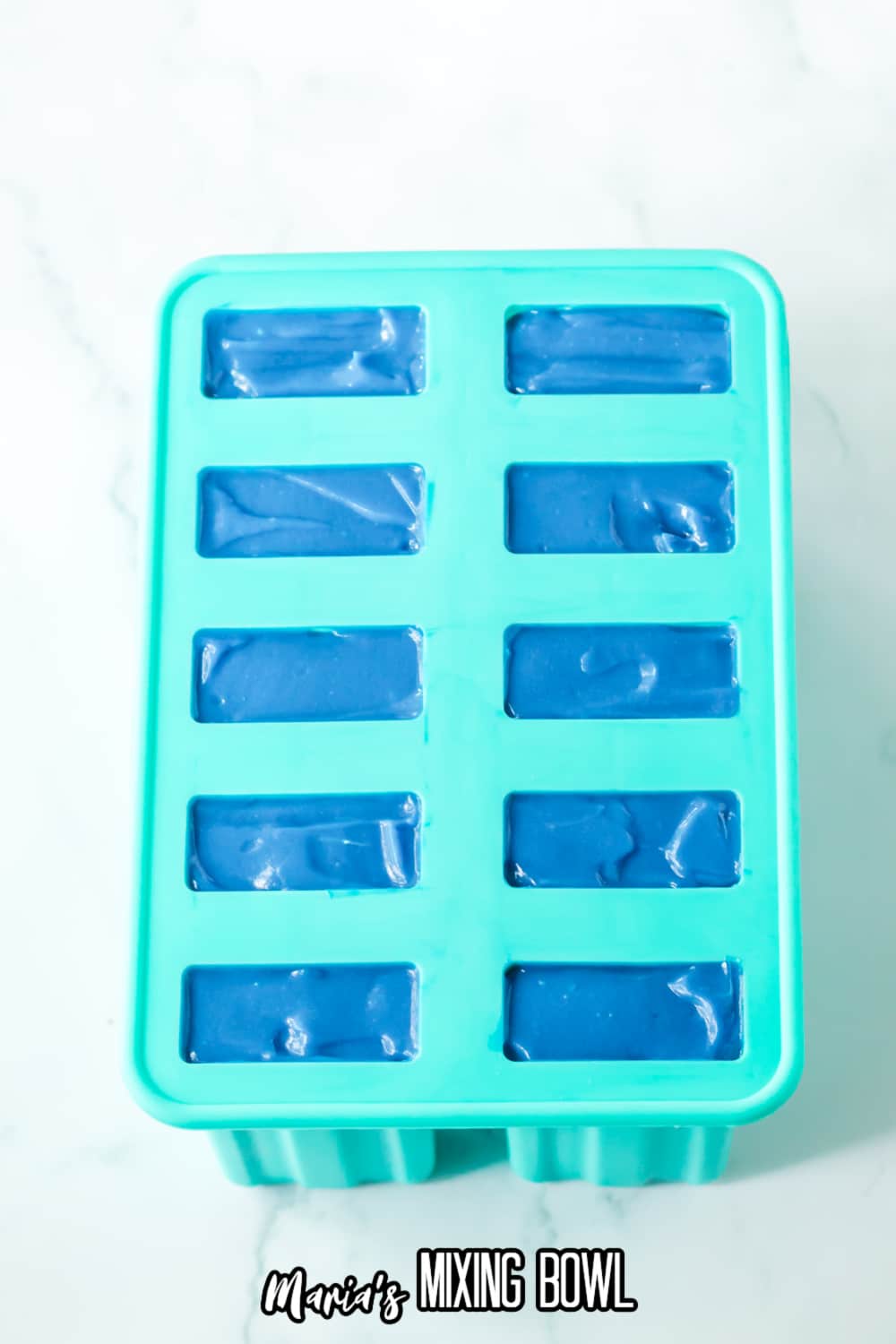 popsicle mold filled with pudding to make the pops