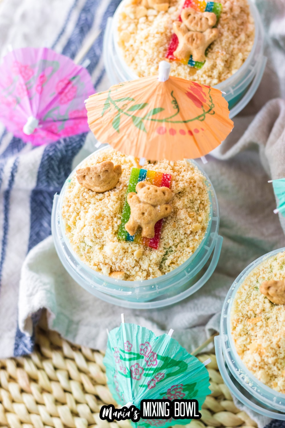 sand bucket dessert in a plastic bucket on a blue and white kitchen towel