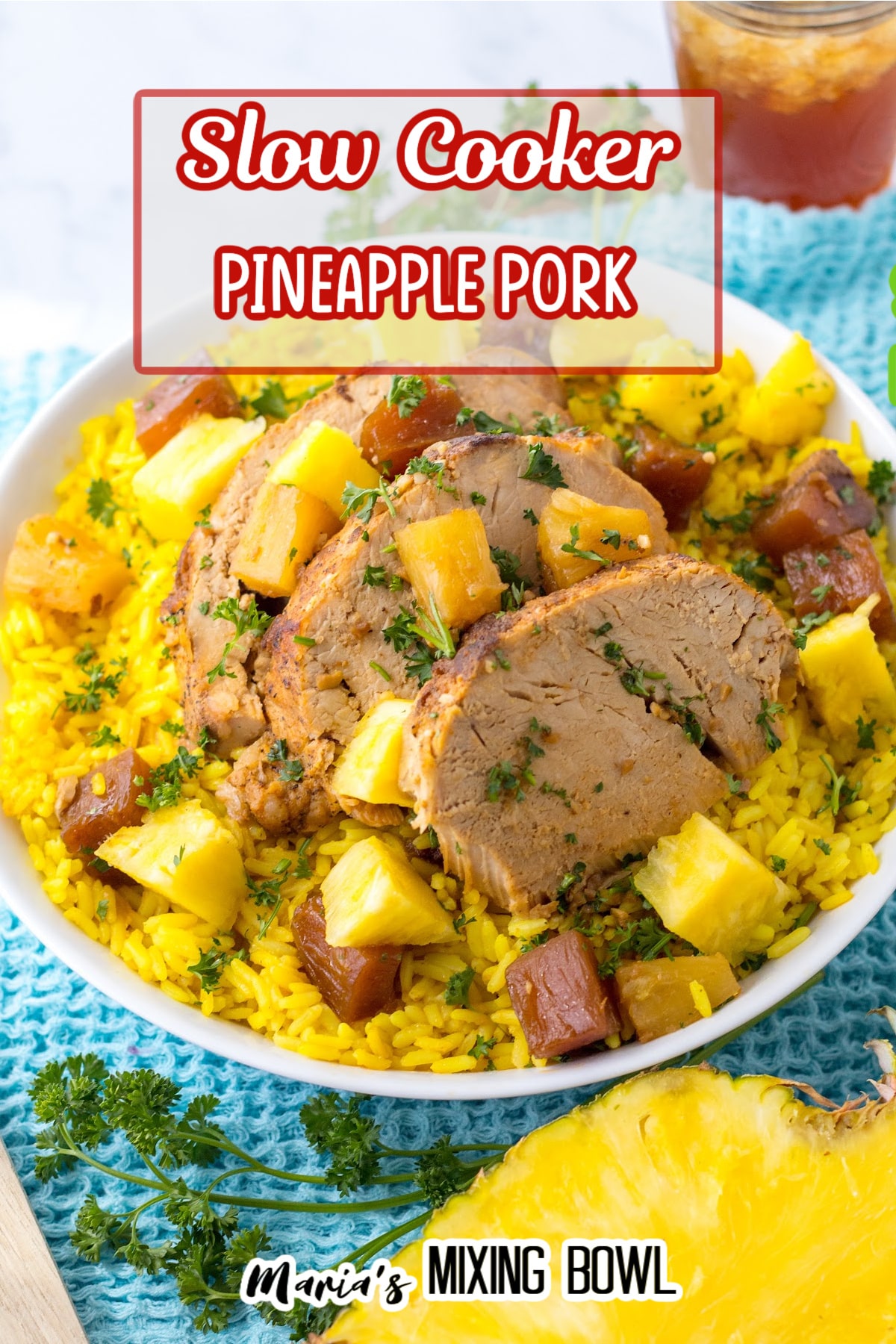 slow cooker pineapple pork on a bed of yellow rice