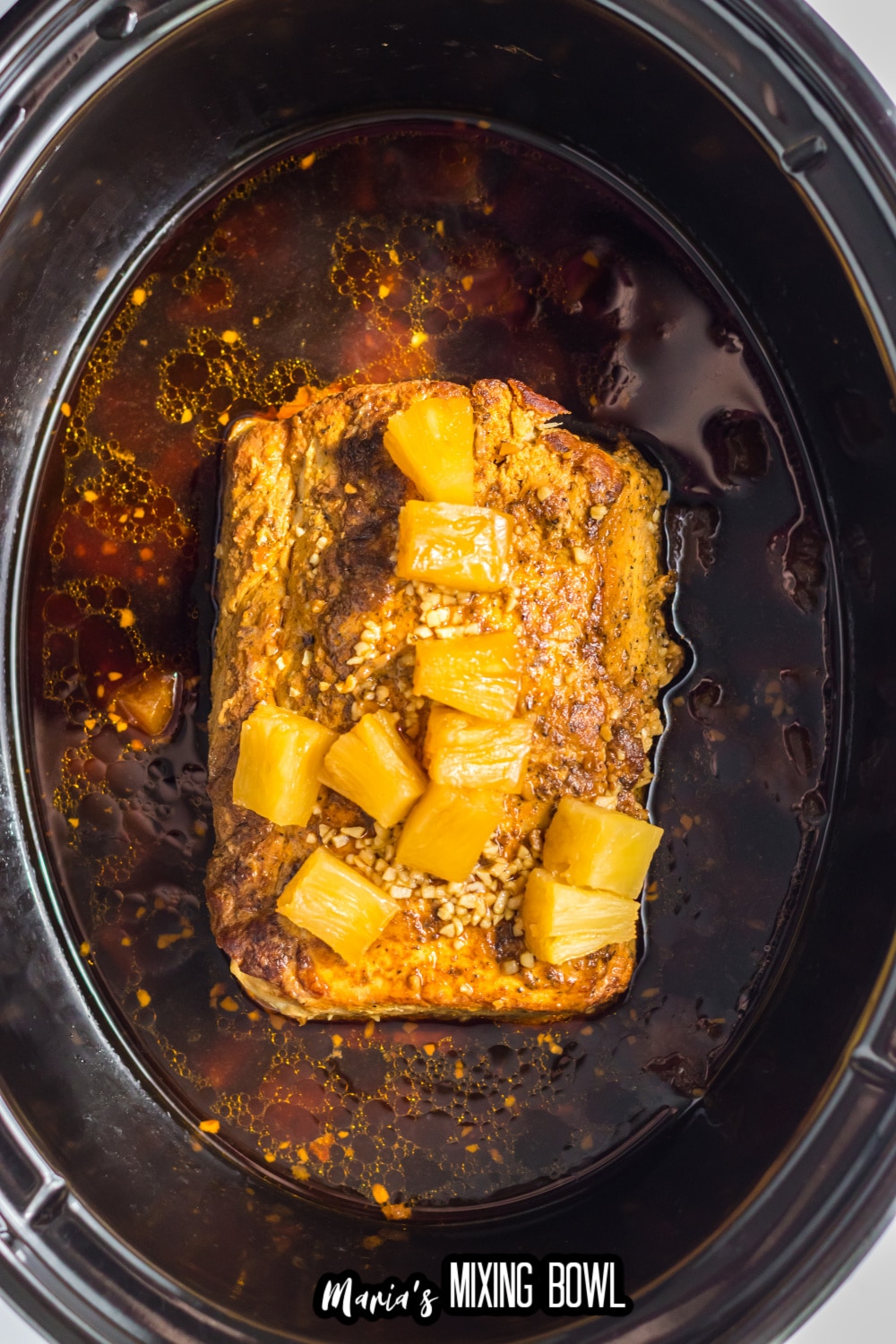 cooked pineapple pork tenderloin in the slow cooker