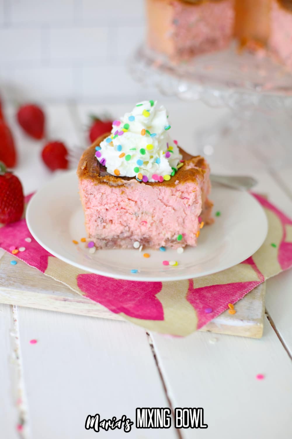 slice of cheesecake on a small white plate