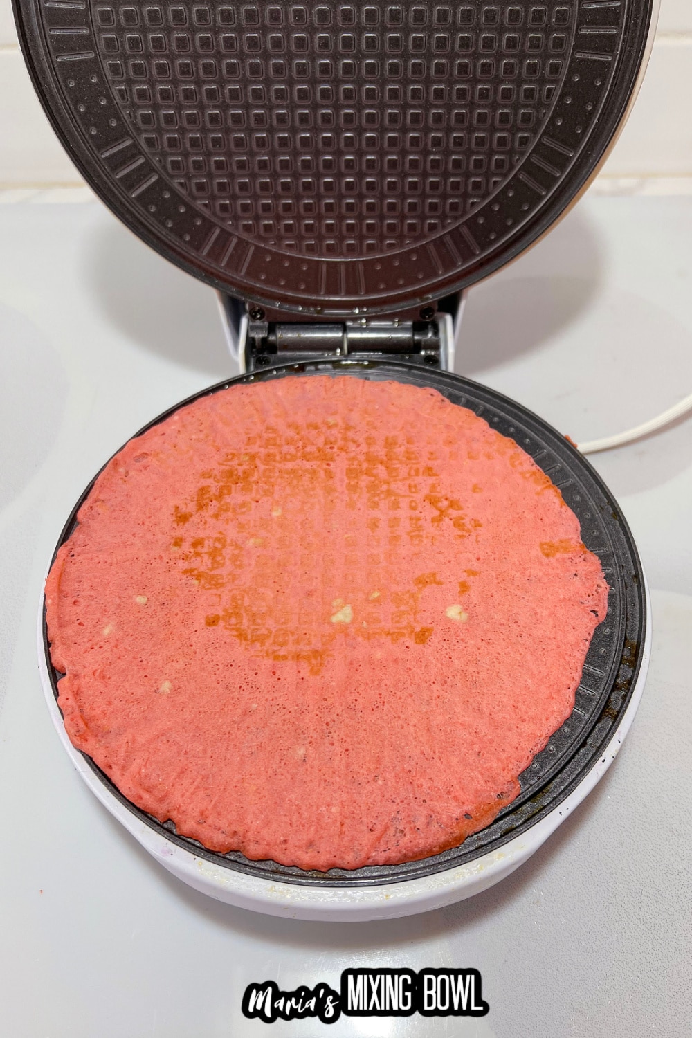 waffle cone being made in a waffle cone maker