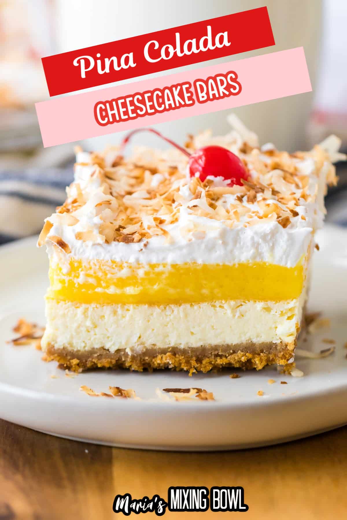 slice of pina colada cheesecake bar on a white plate