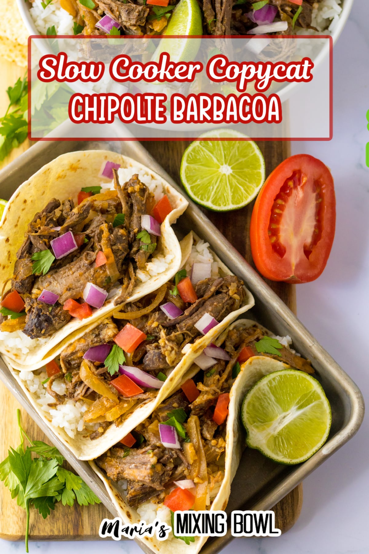 copycat chipotle barbacoa tacos on a metal baking tray with a lime half