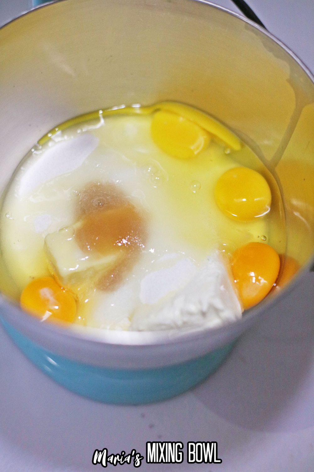 eggs, sugar, and vanilla in a stand mixer 