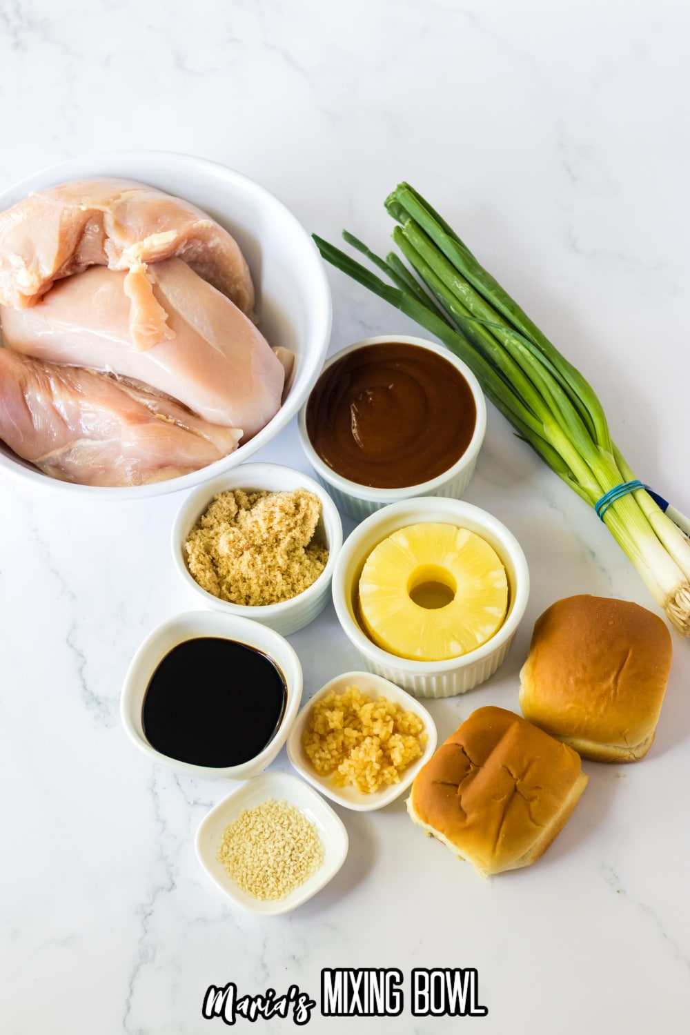 bowls of raw chicken breasts, brown sugar, green onions, bbq sauce, garlic,, pineapple rings and rolls