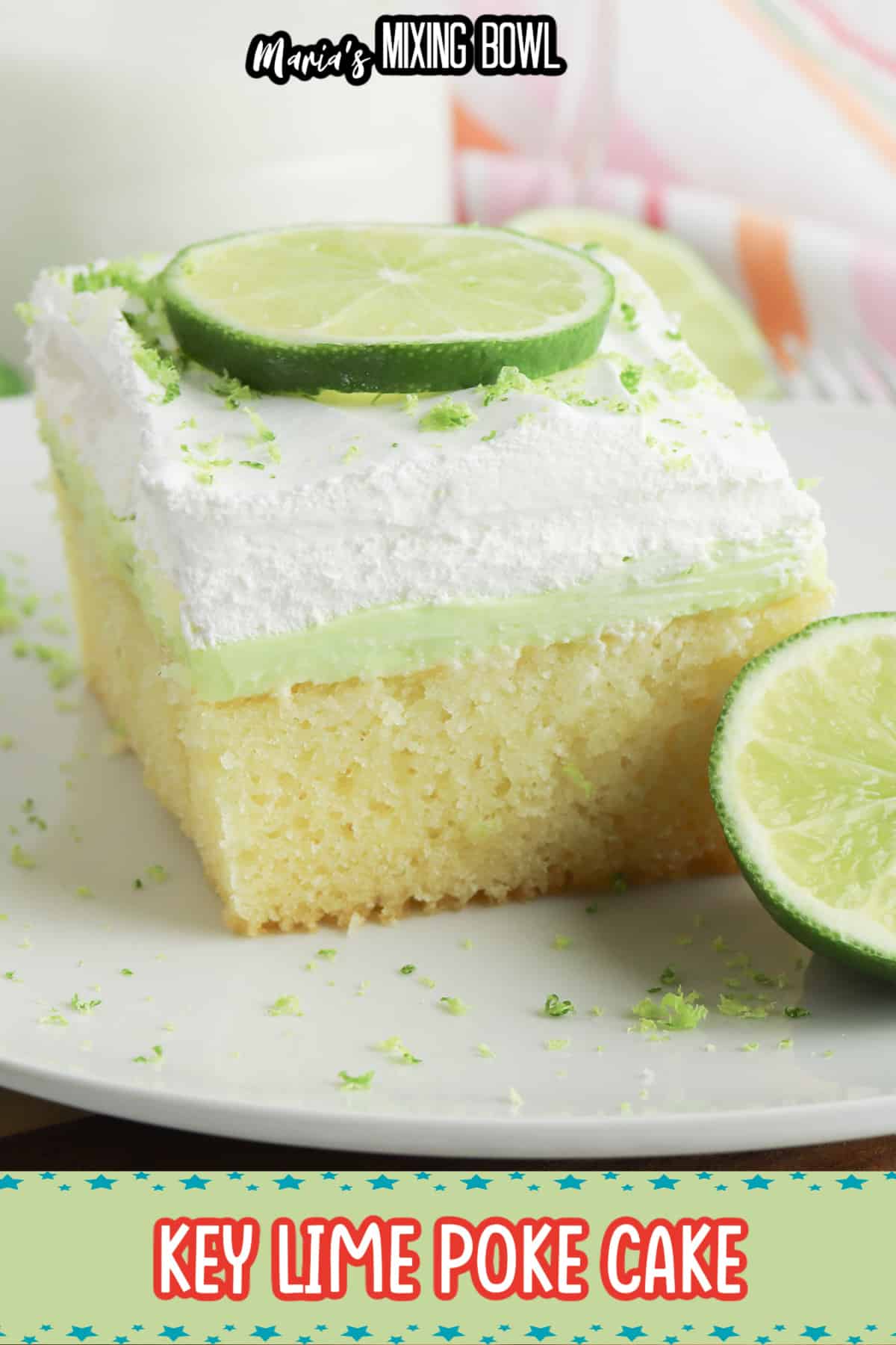 finished key lime poke cake in a glass baking dish topped with lime zest