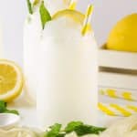 two lemonade slushies on a white background