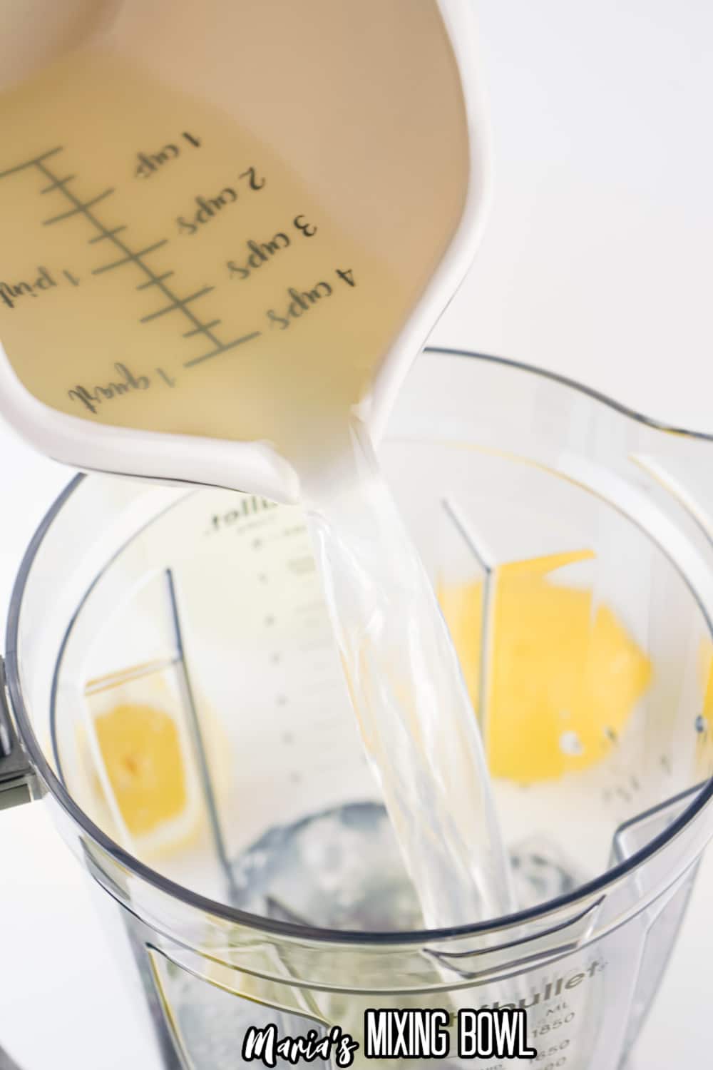 lemonade being poured into a blender