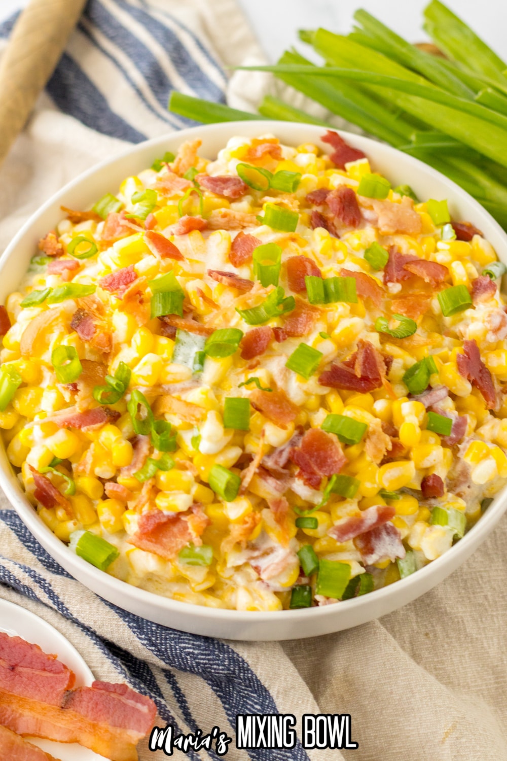 white bowl filled with loaded cream corn