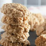 stack of five no bake peanut butter cookies on a slate gray stray