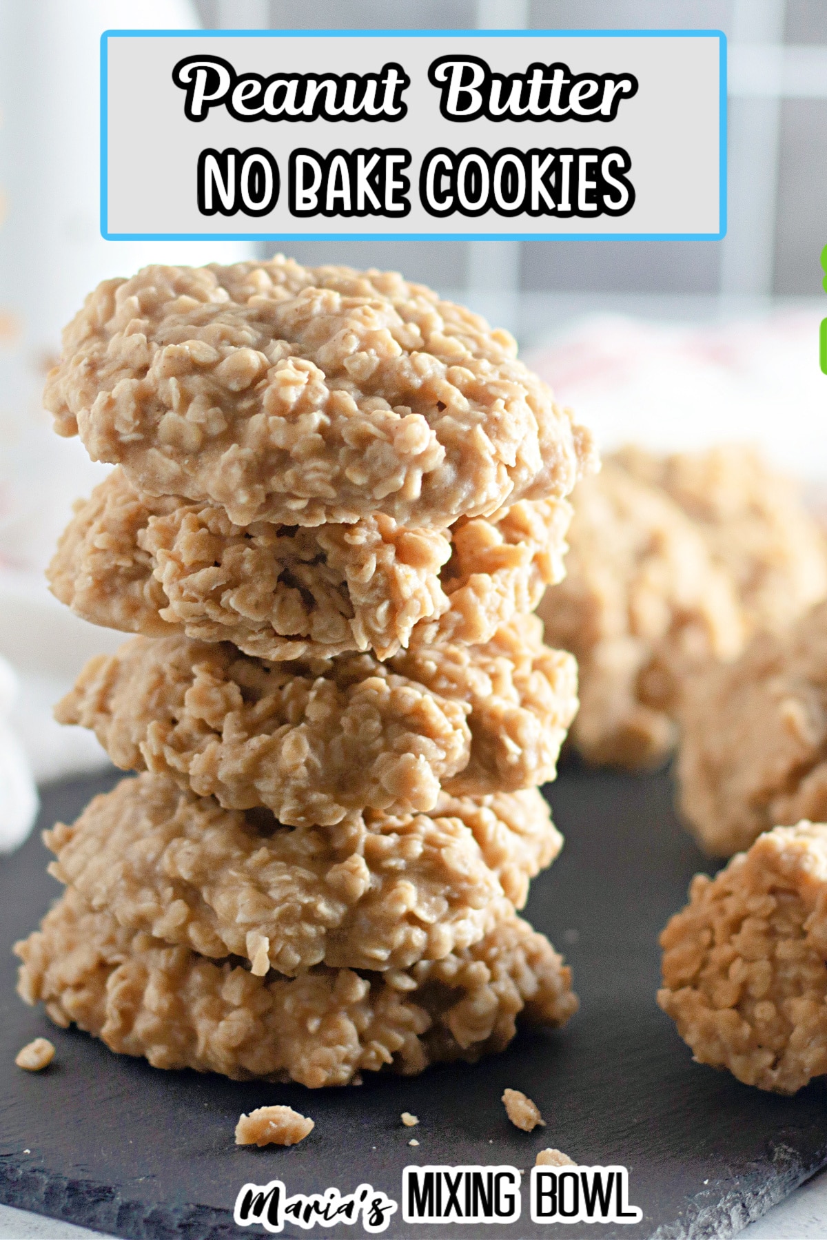 stack of five no bake peanut butter cookies on a slate gray stray