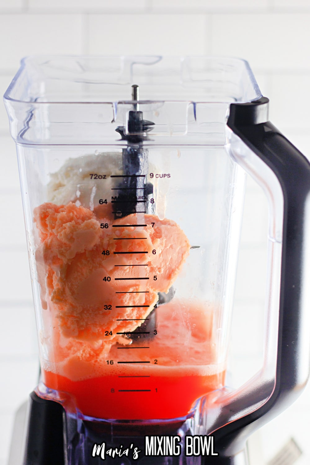 orange soda, sherbet, and vanilla ice cream in a blender