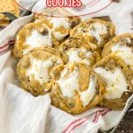 smores cookies in a kitchen towel lined baking pan