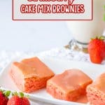 slices strawberry cake mix brownies on a white platter
