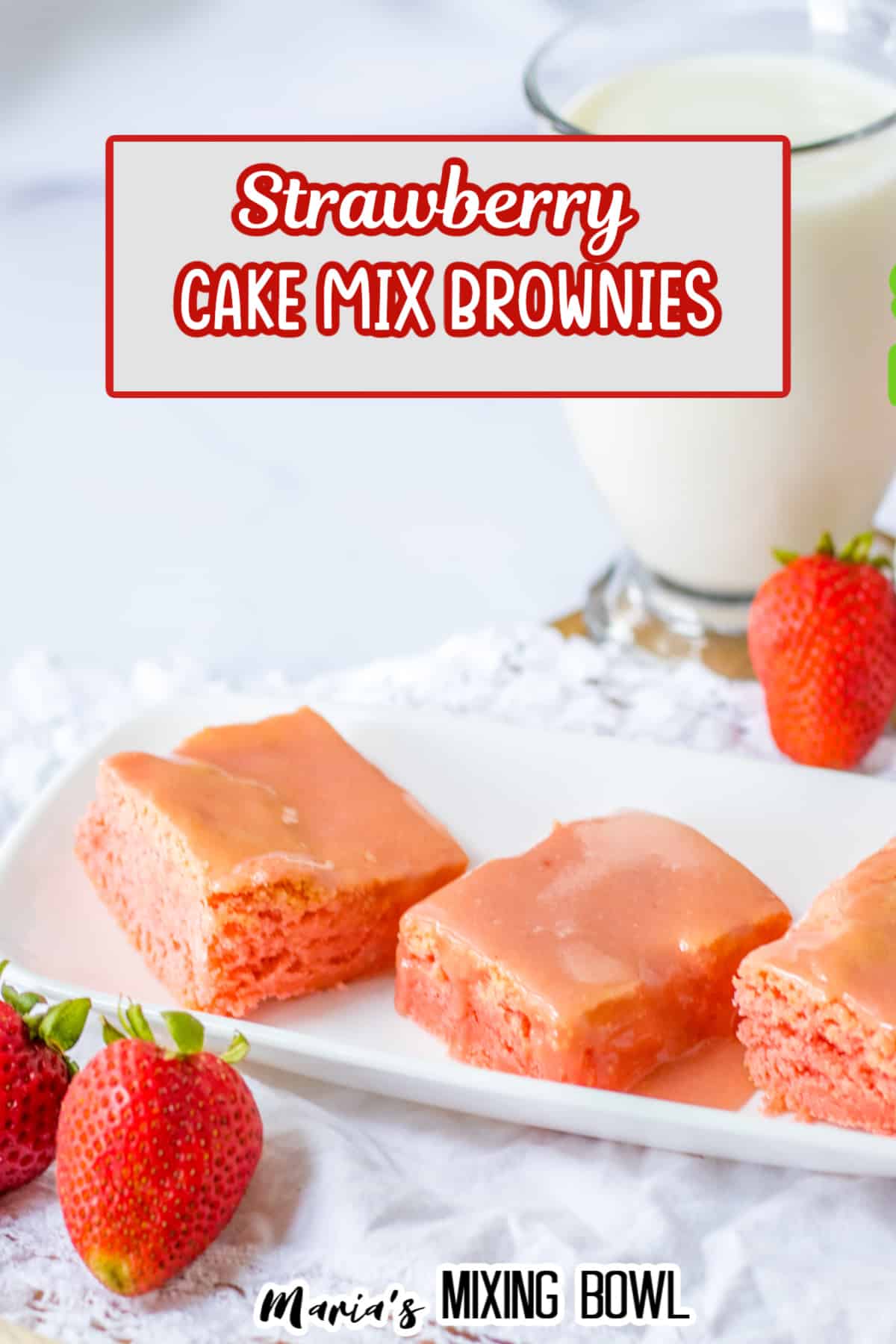 slices strawberry cake mix brownies on a white platter