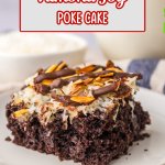 slice of almond joy poke cake on a white plate