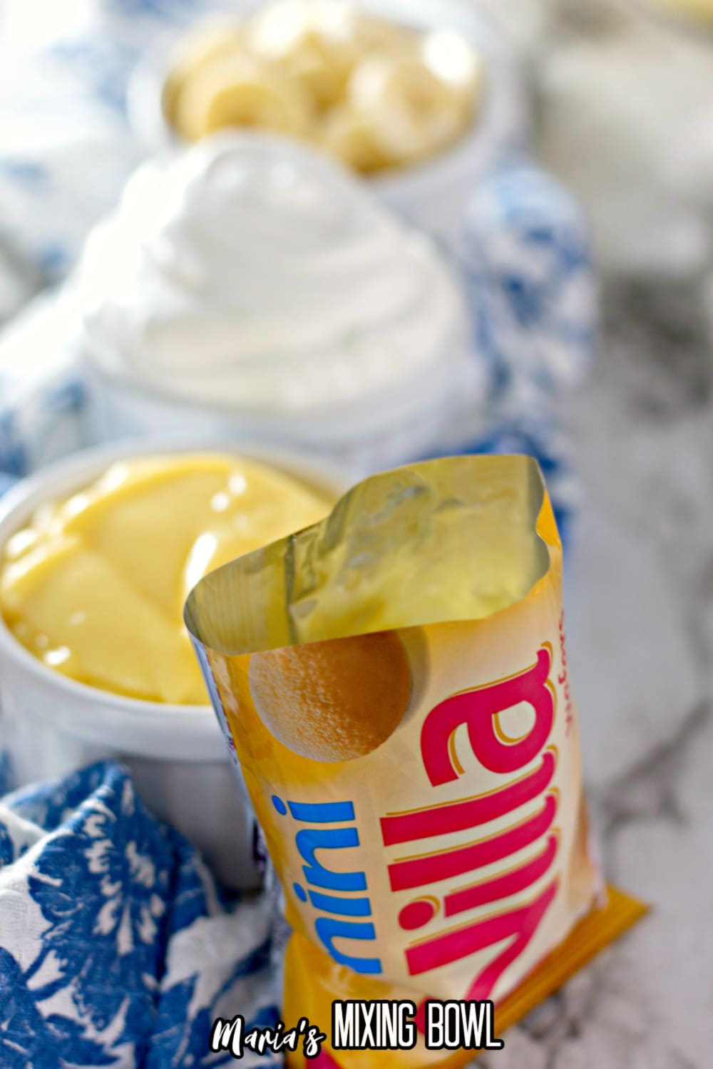 mini nilla wafer bag with a bowl of vanilla pudding behind it