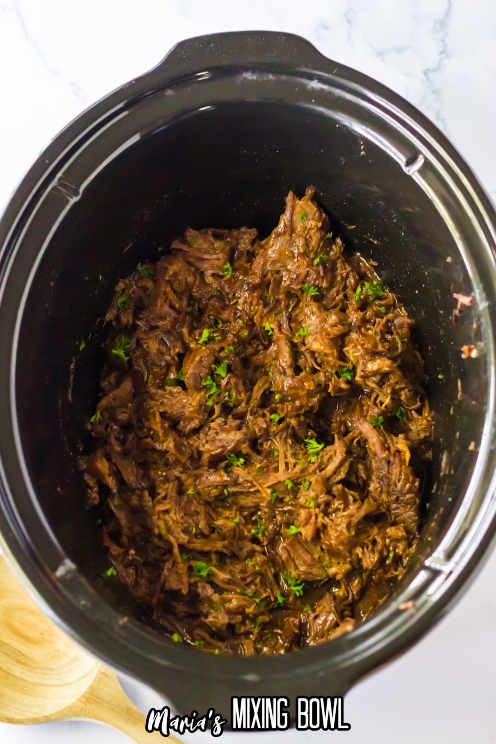shredded beef in a slow cooker.