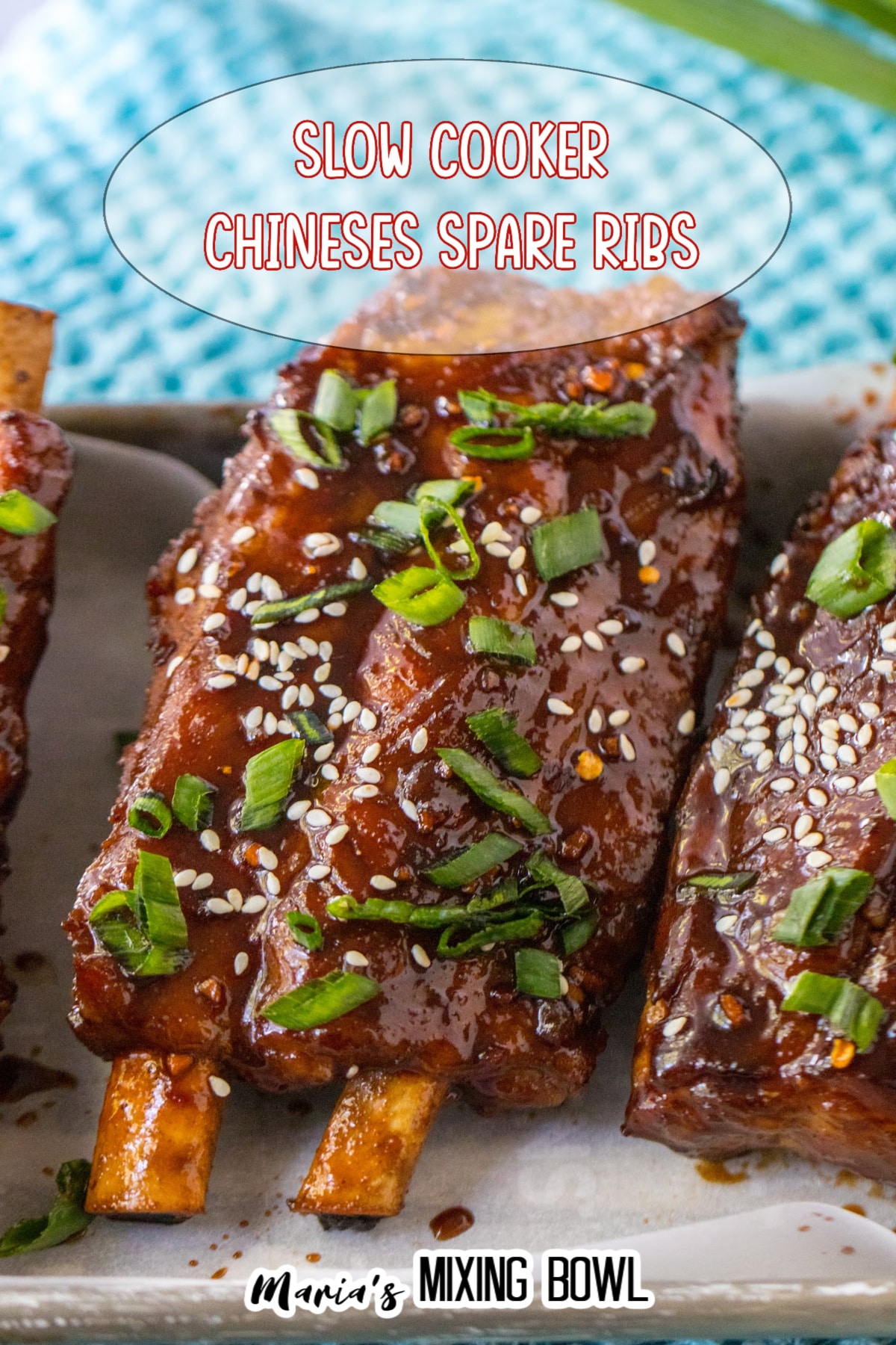 chinese spare ribs on a white rectangular plate