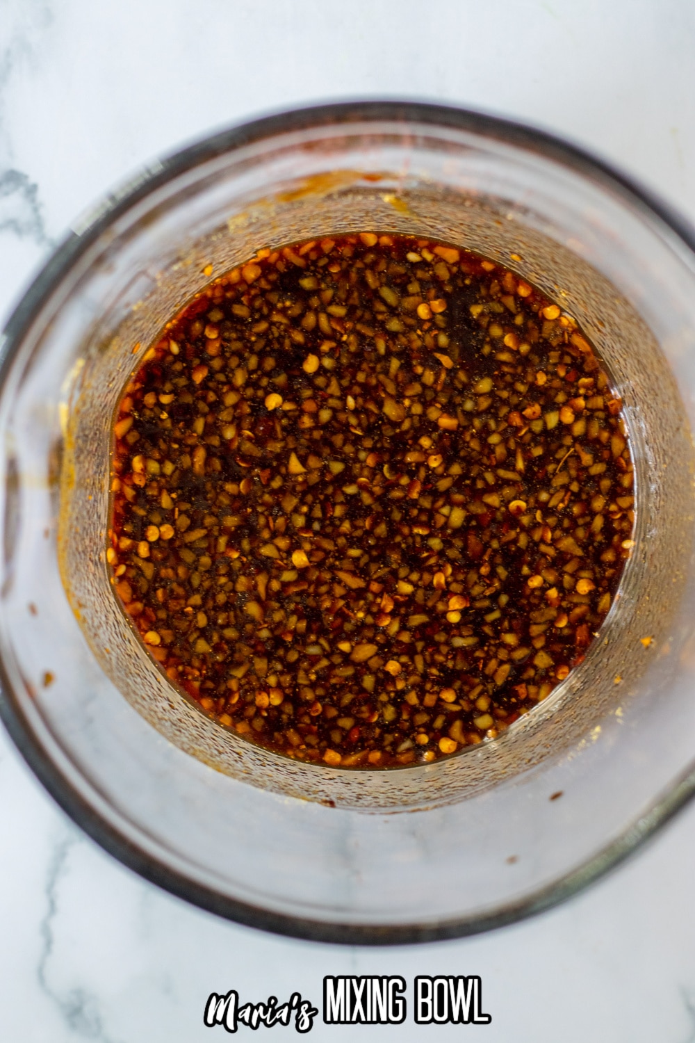 chinese inspired sauce in a glass measuring cup