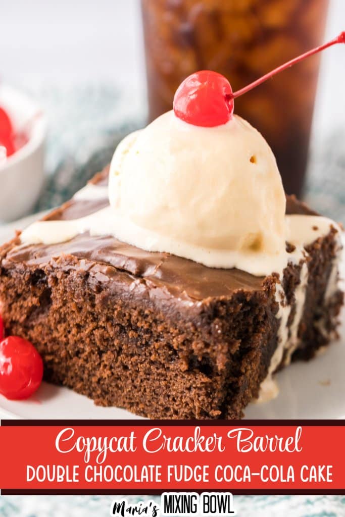 slice of double fudge coca cola cake on a small white plate topped with a scoop of ice cream