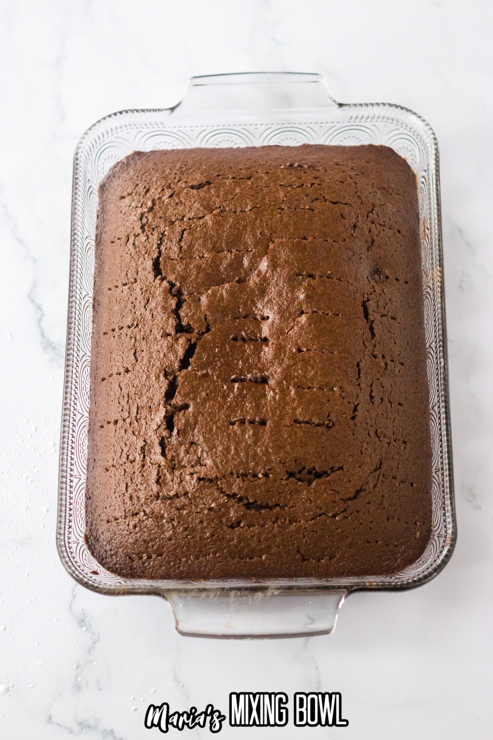 chocolate cake in a glass baking dish
