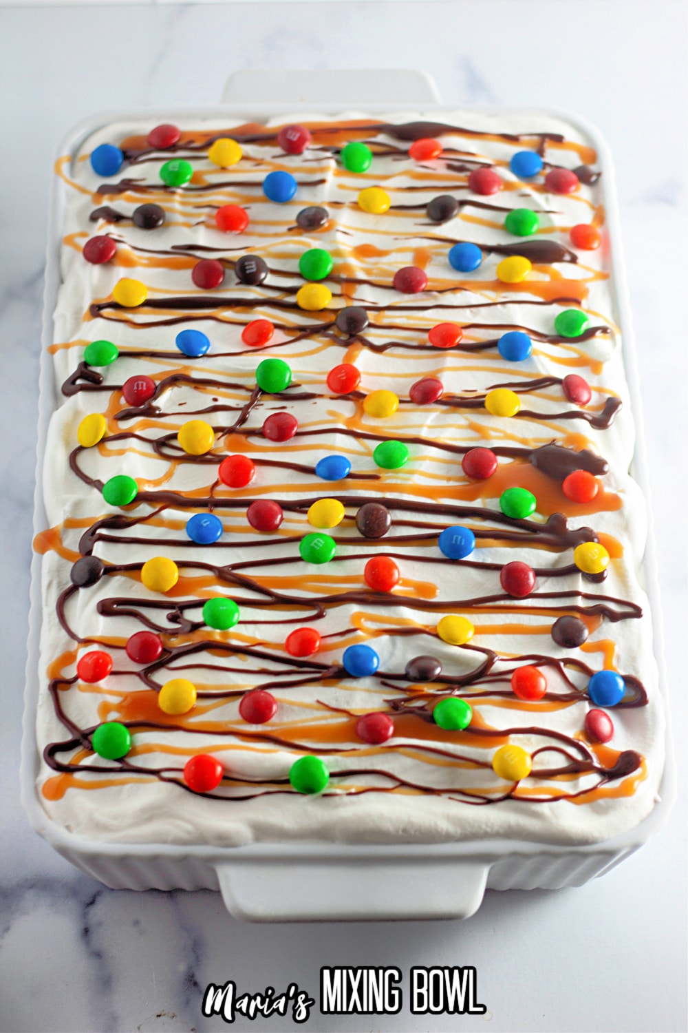 uncut ice cream sandwich cake in a white casserole dish