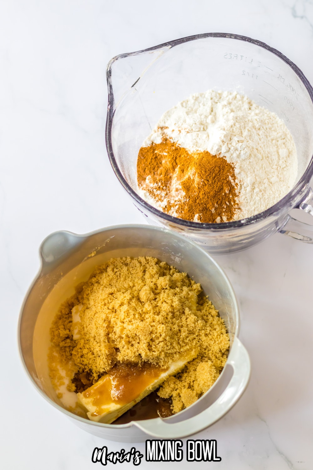 bowls of flour, salt and cinnamon and a bowl of butter and brown sugar in a white bowl