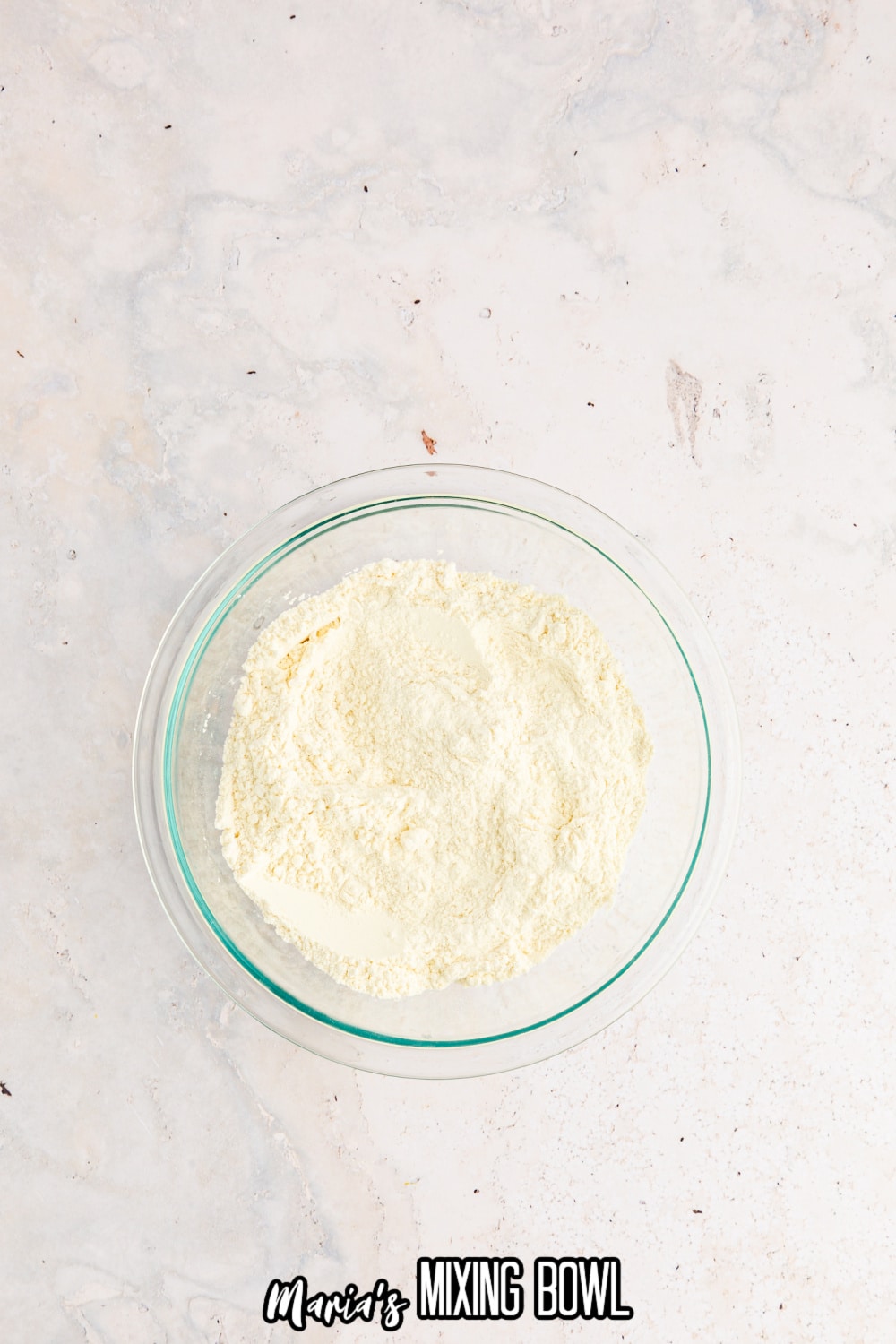 flour, salt, and baking powder, and baking soda in a glass mixing bowl