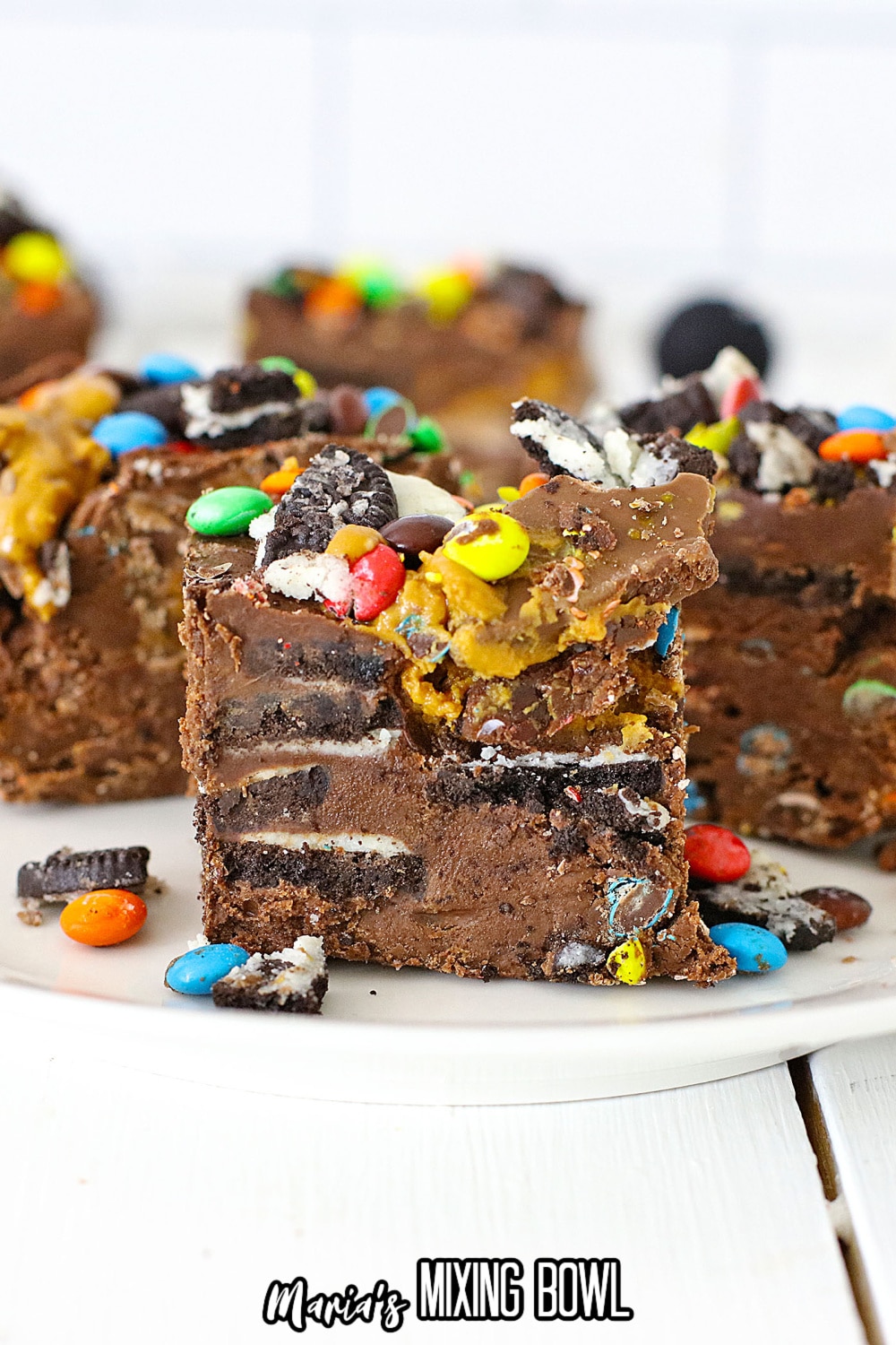 three pieces of peanut butter cup fudge on a plate
