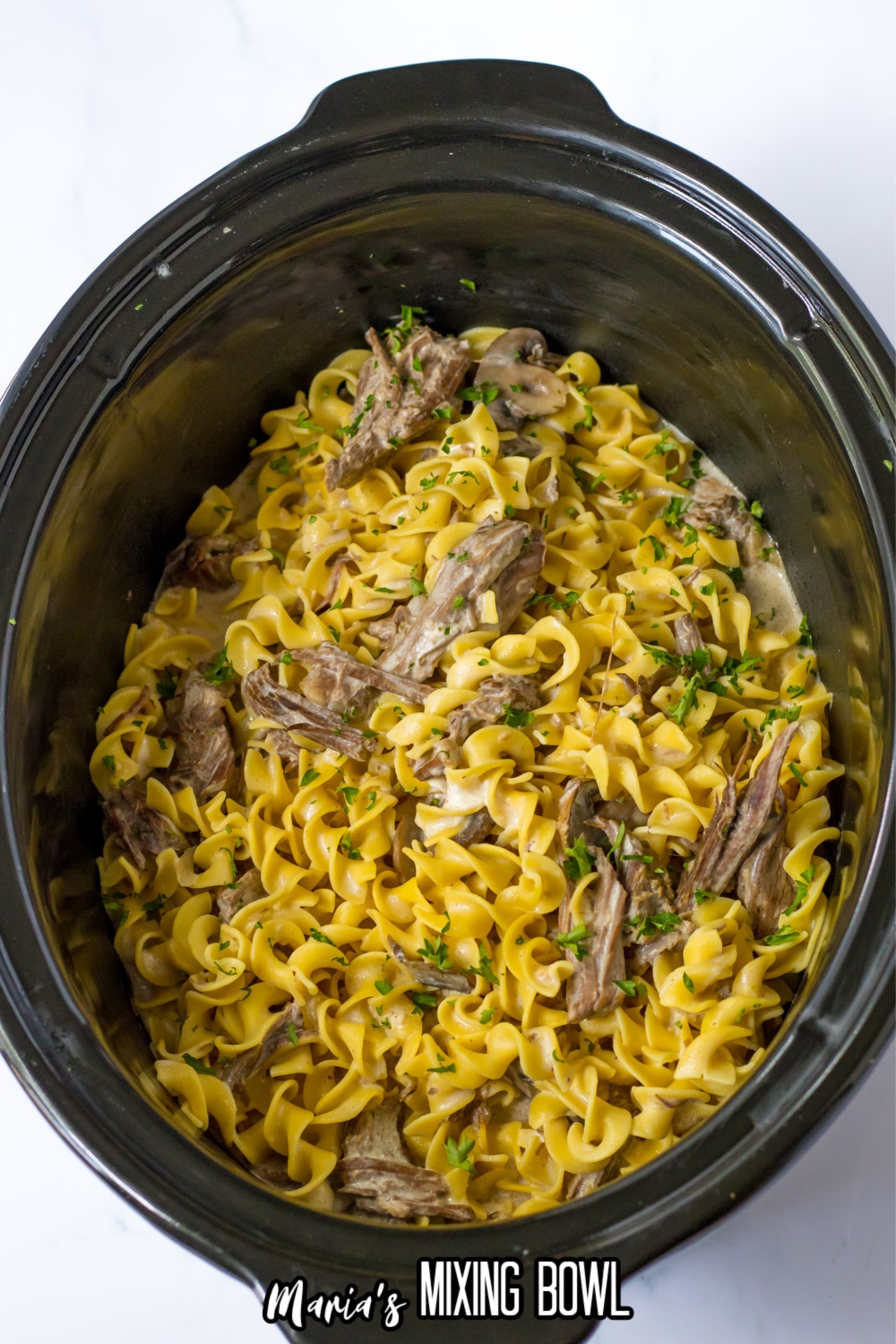 finished beef stroganoff in a slow cooker