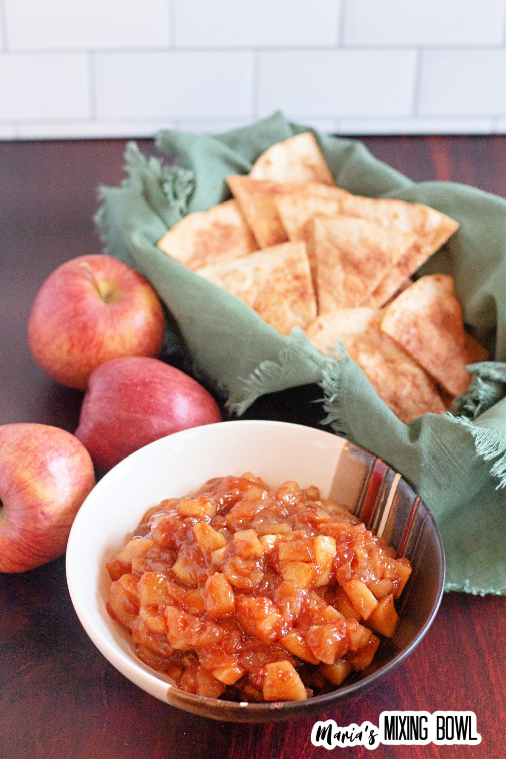 bowl of apple salsa and a basket of cinnamon sugar tortilla chips.