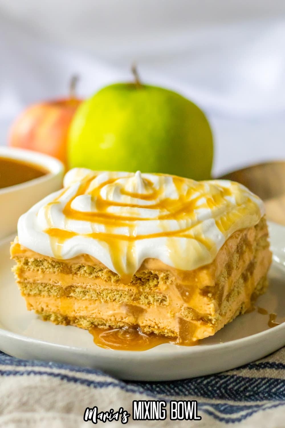 slice of caramel apple icebox cake on a white plate.