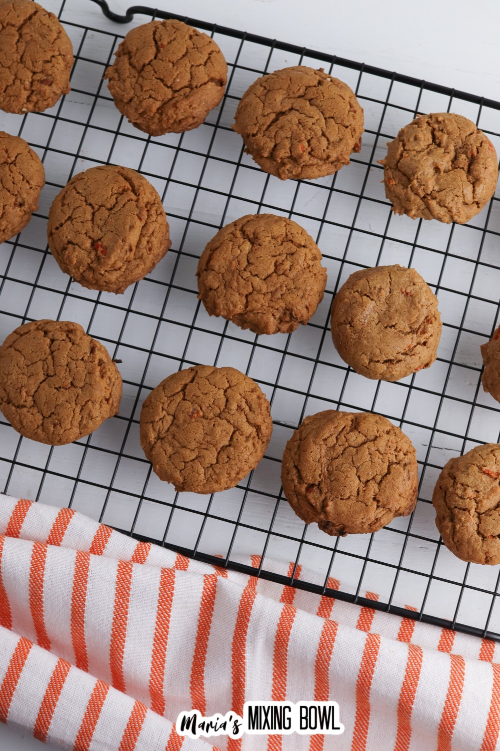carrot cookies cooling on a wire rack.