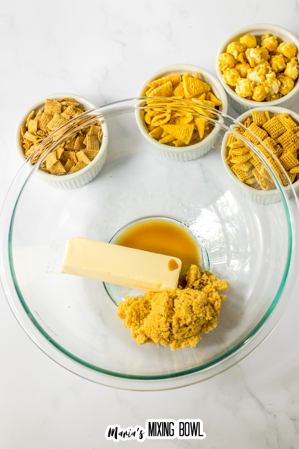butter, brown sugar, vanilla extract in a glass mixing bowl.