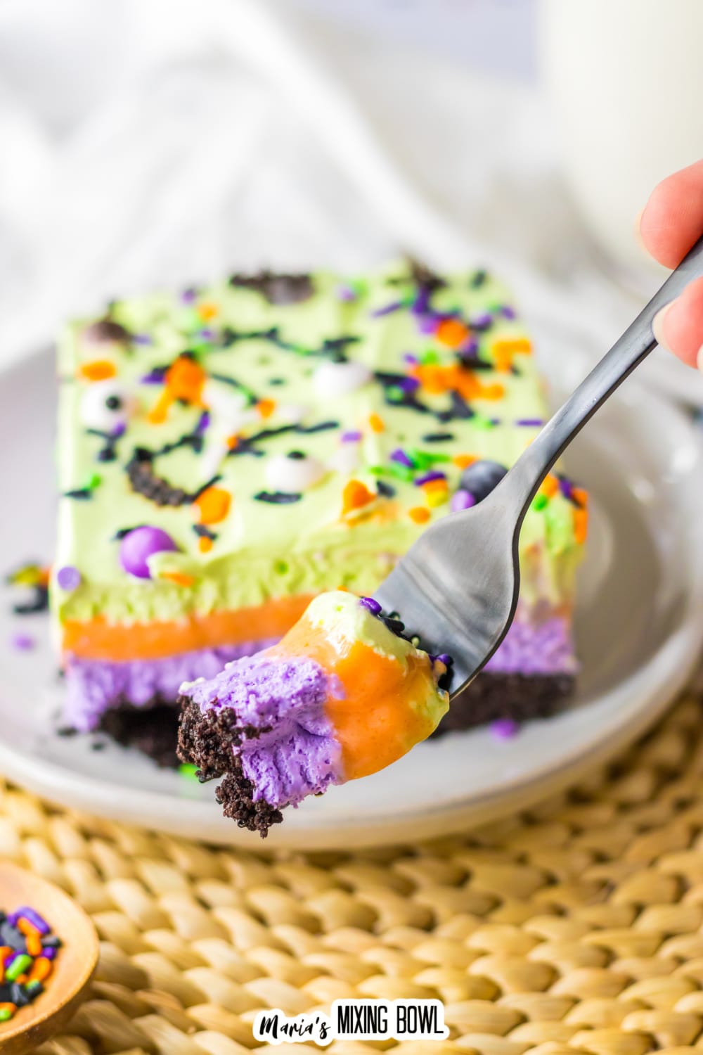 bite of halloween lush on stainless fork held in the air.