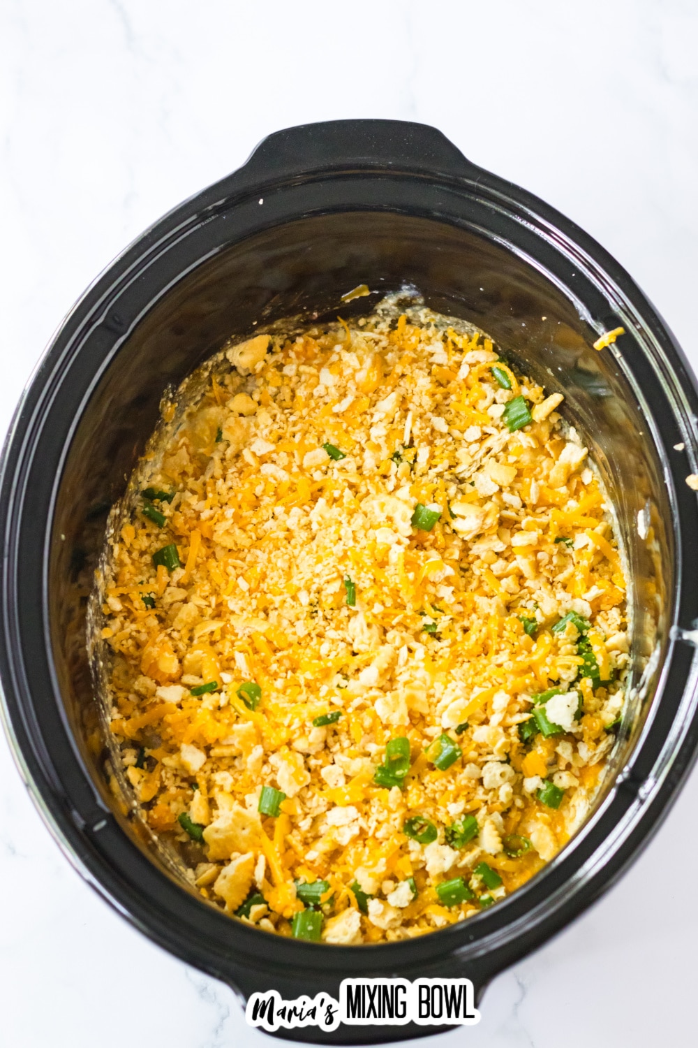 uncooked million dollar chicken in a slow cooker.