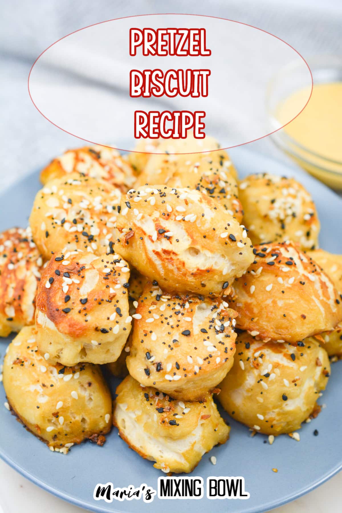 pretzel bites stacked in a pyramid on a plate.
