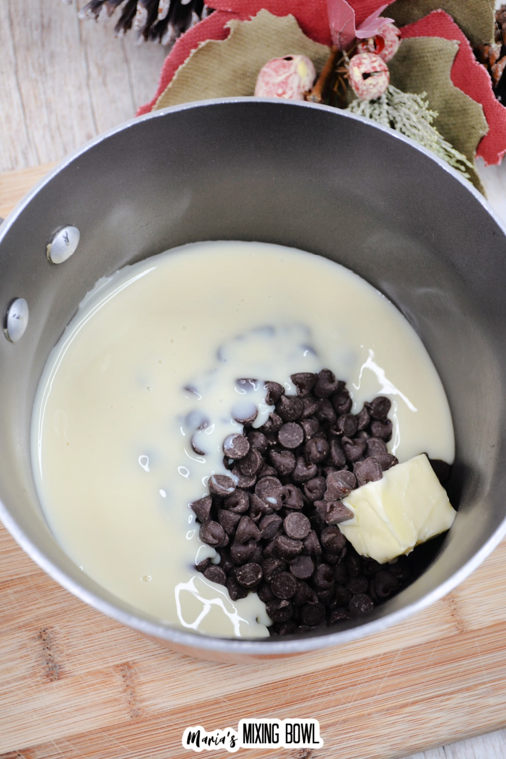 chocolate chips, butter, and sweetened condensed milk in a saucepan.