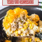 spoonful of slow cooker tater tot casserole held in the air.