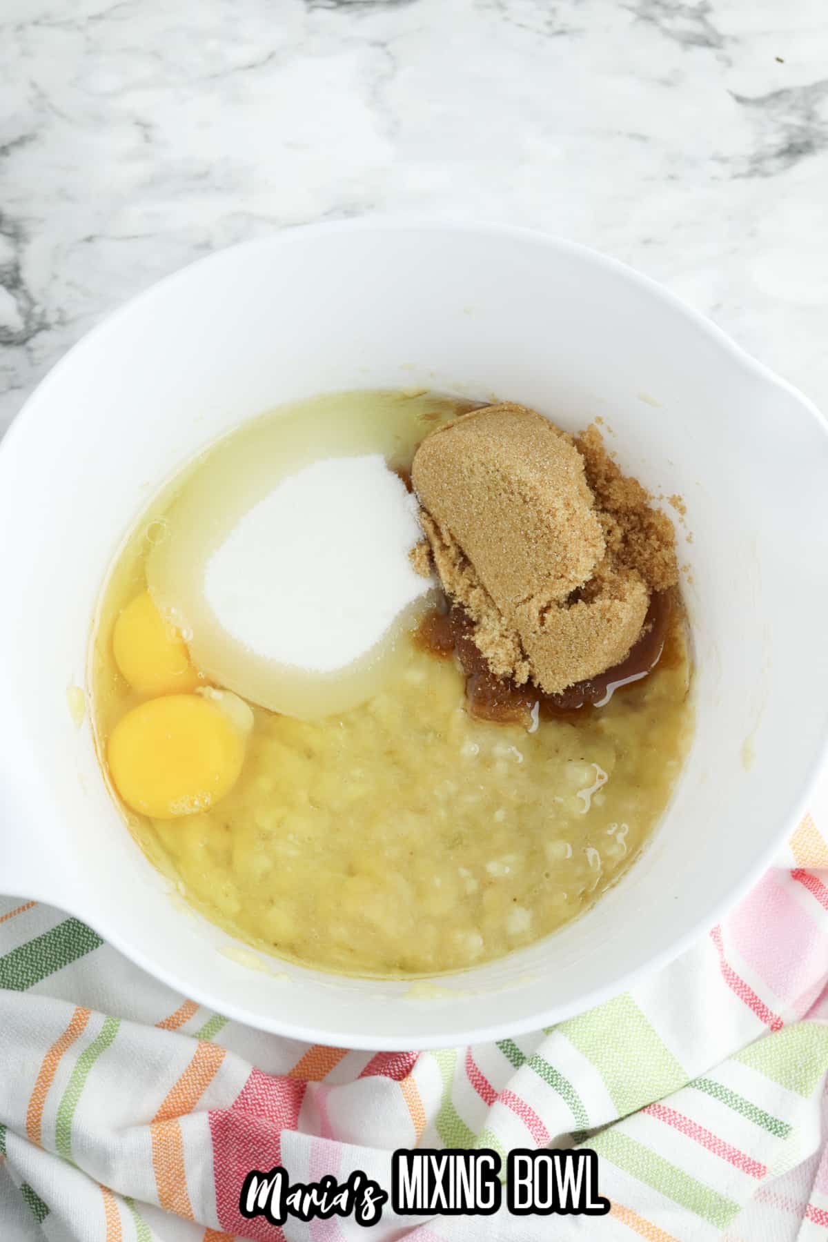 eggs, sugar, mashed bananas, and brown sugar in a large mixing bowl.
